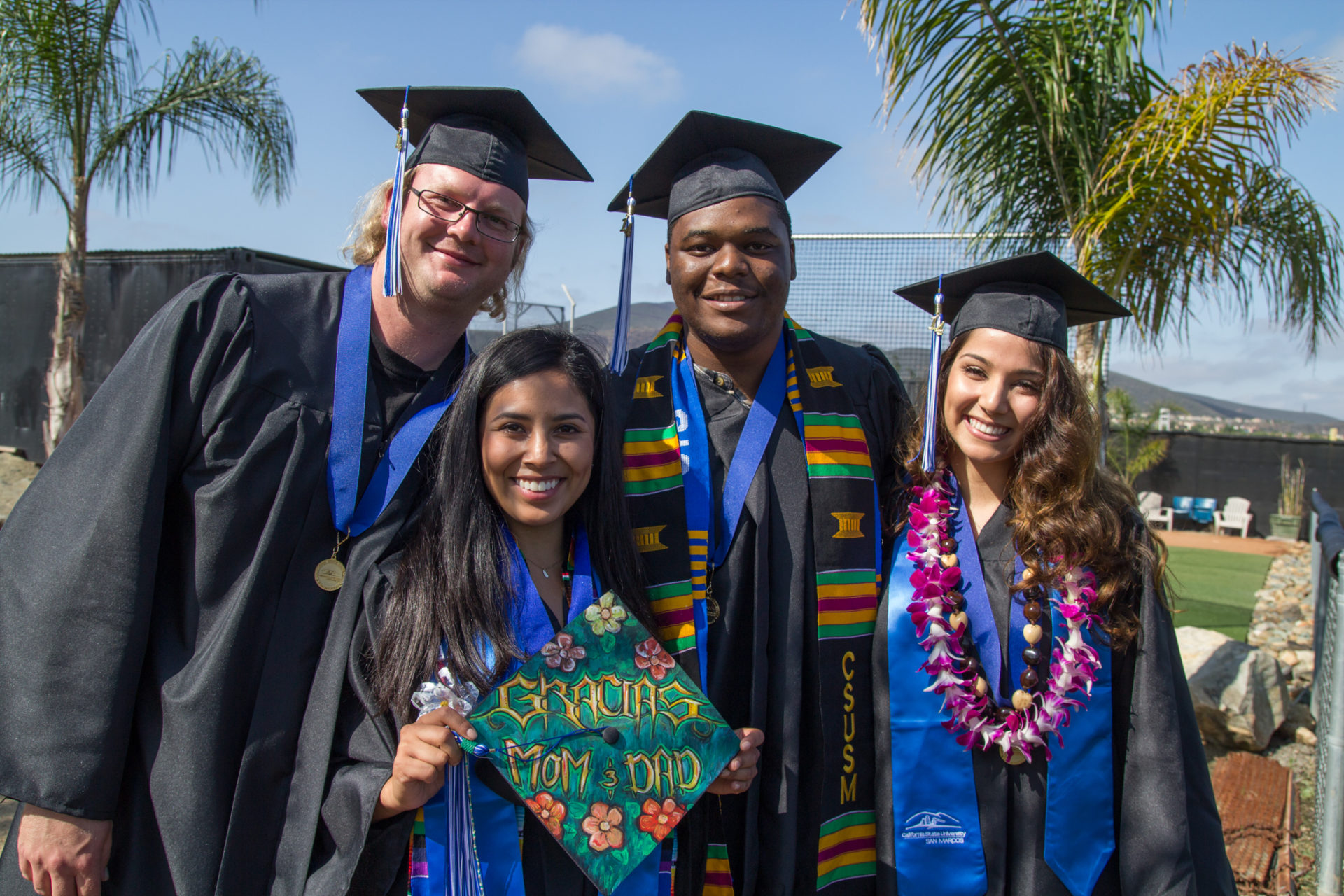 A photo of CSUSM graduates celebrating